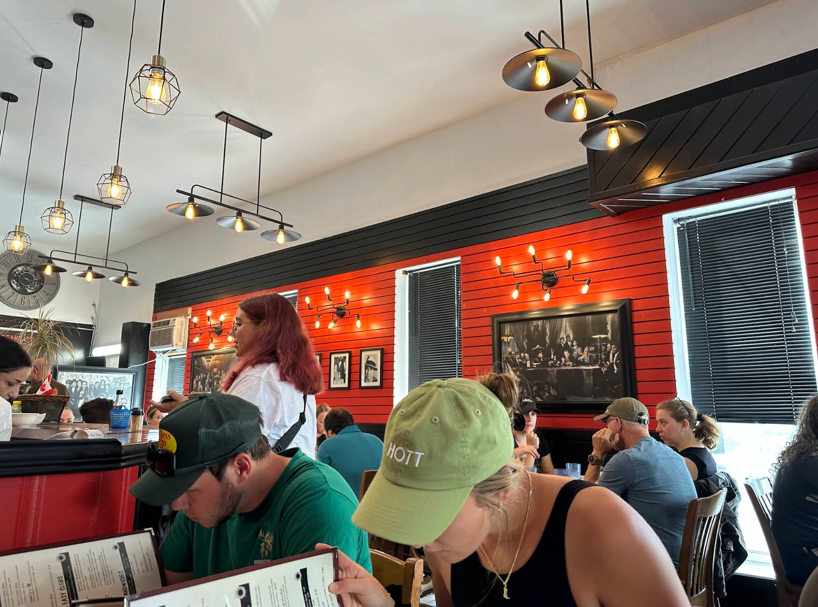Inside the cafe with red walls and lights